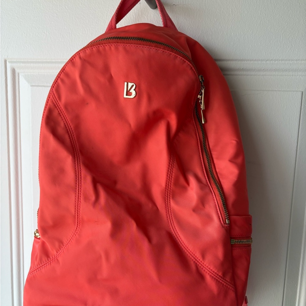 Red Backpack with Gold Accents